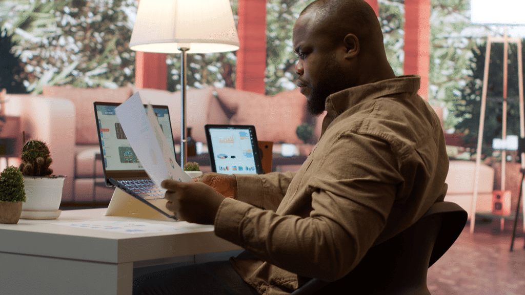Nigerian business professional reviewing AI-generated content, illustrating the AI intelligence layer gap